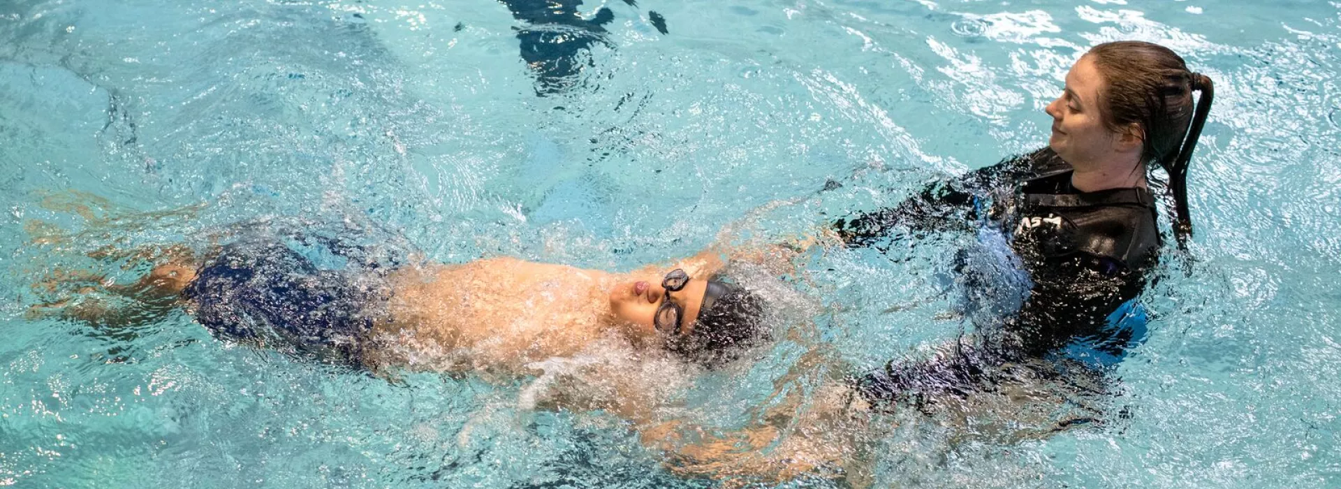 Woman giving swim lessons at the YMCA